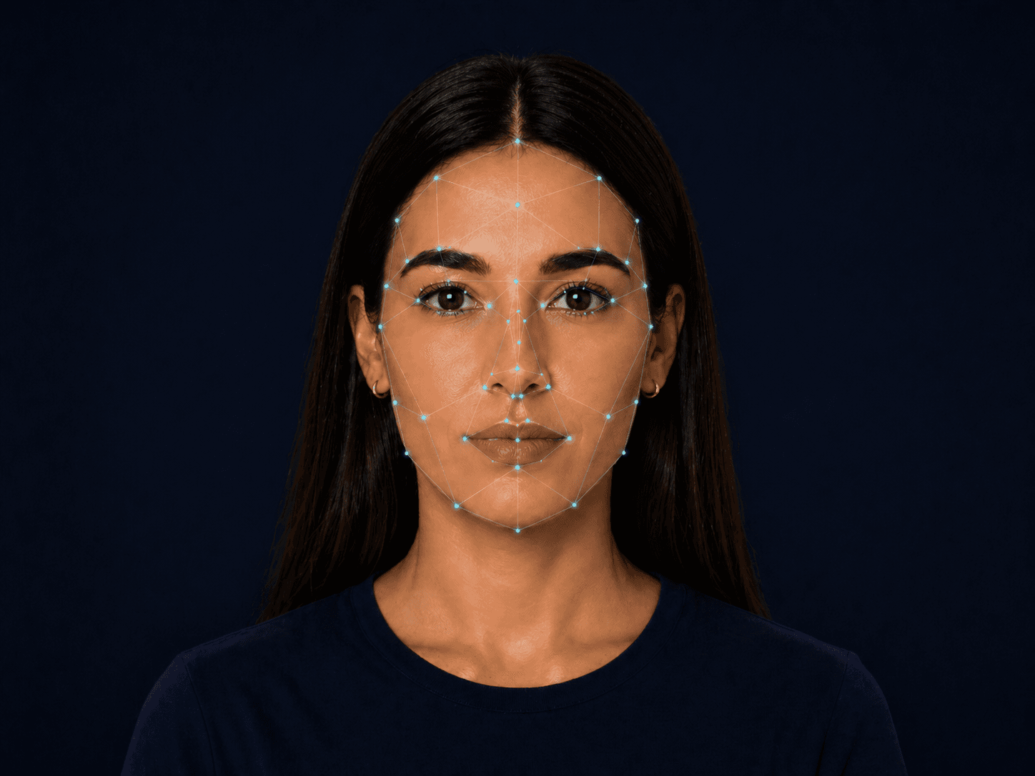 Diagram of common facial metrics: facial thirds, symmetry line, and eye ratio.