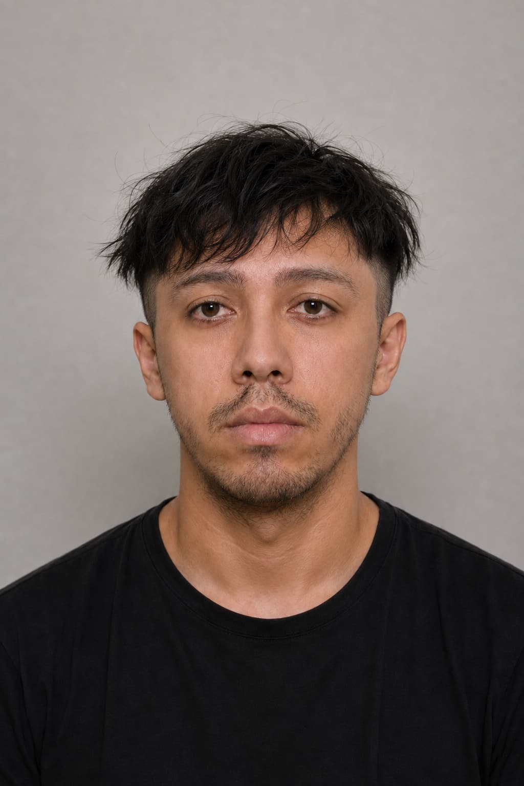 Front-facing demo portrait used for the example age estimate